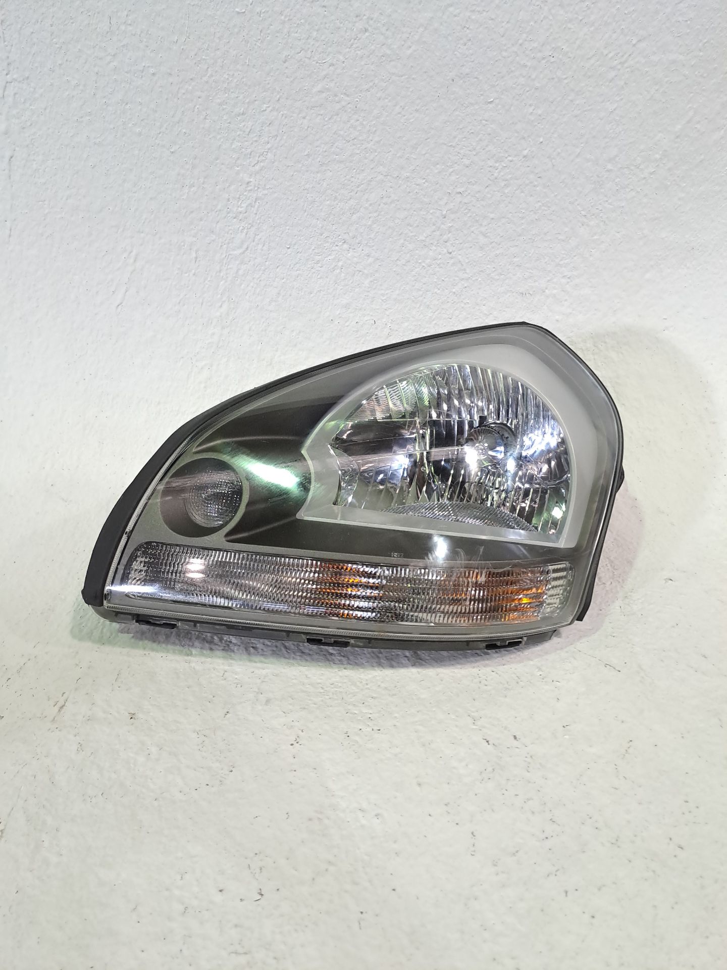 Scheinwerfer links HYUNDAI TUCSON (JM)
