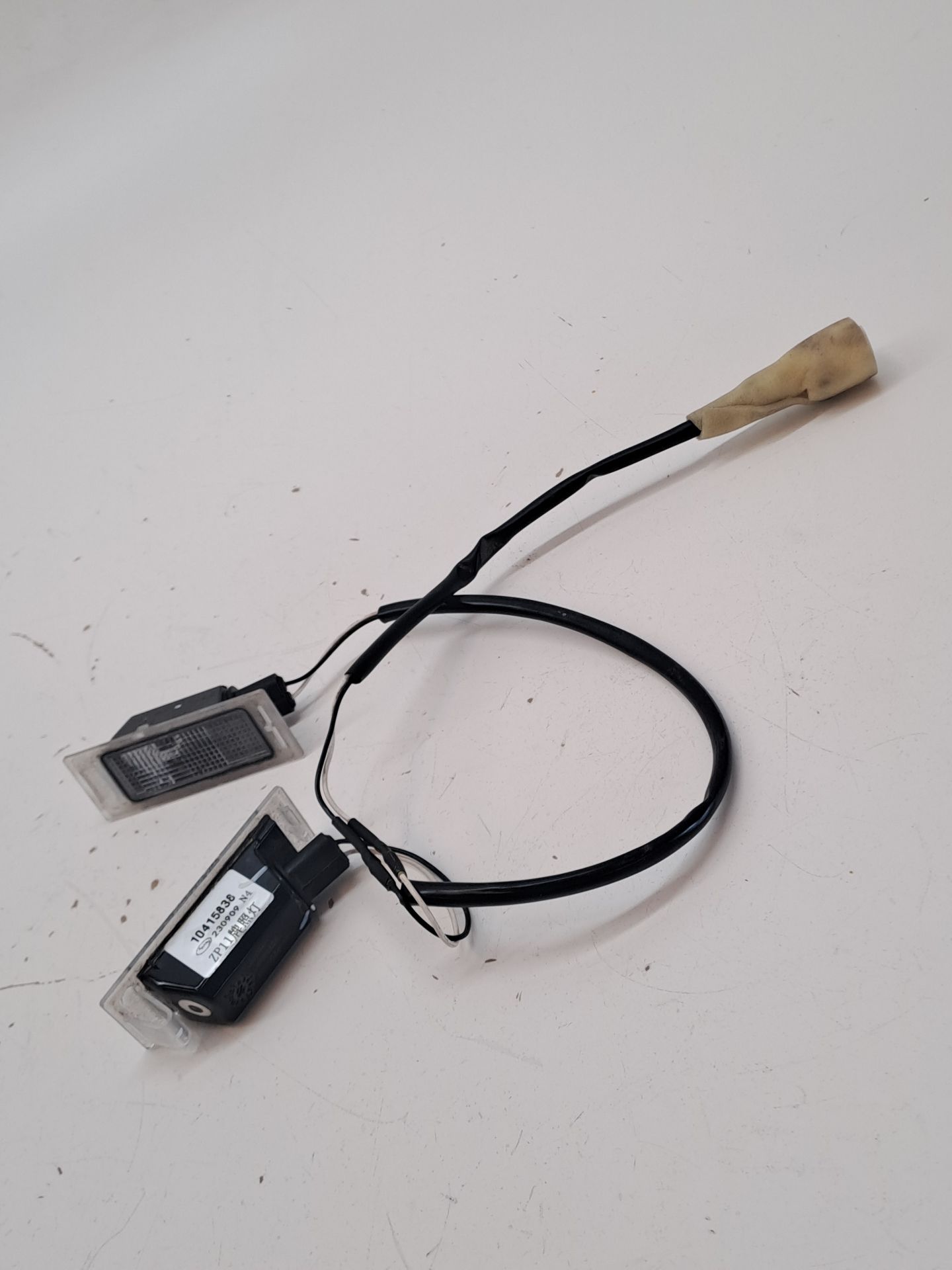 Luz da matrícula MG ZS