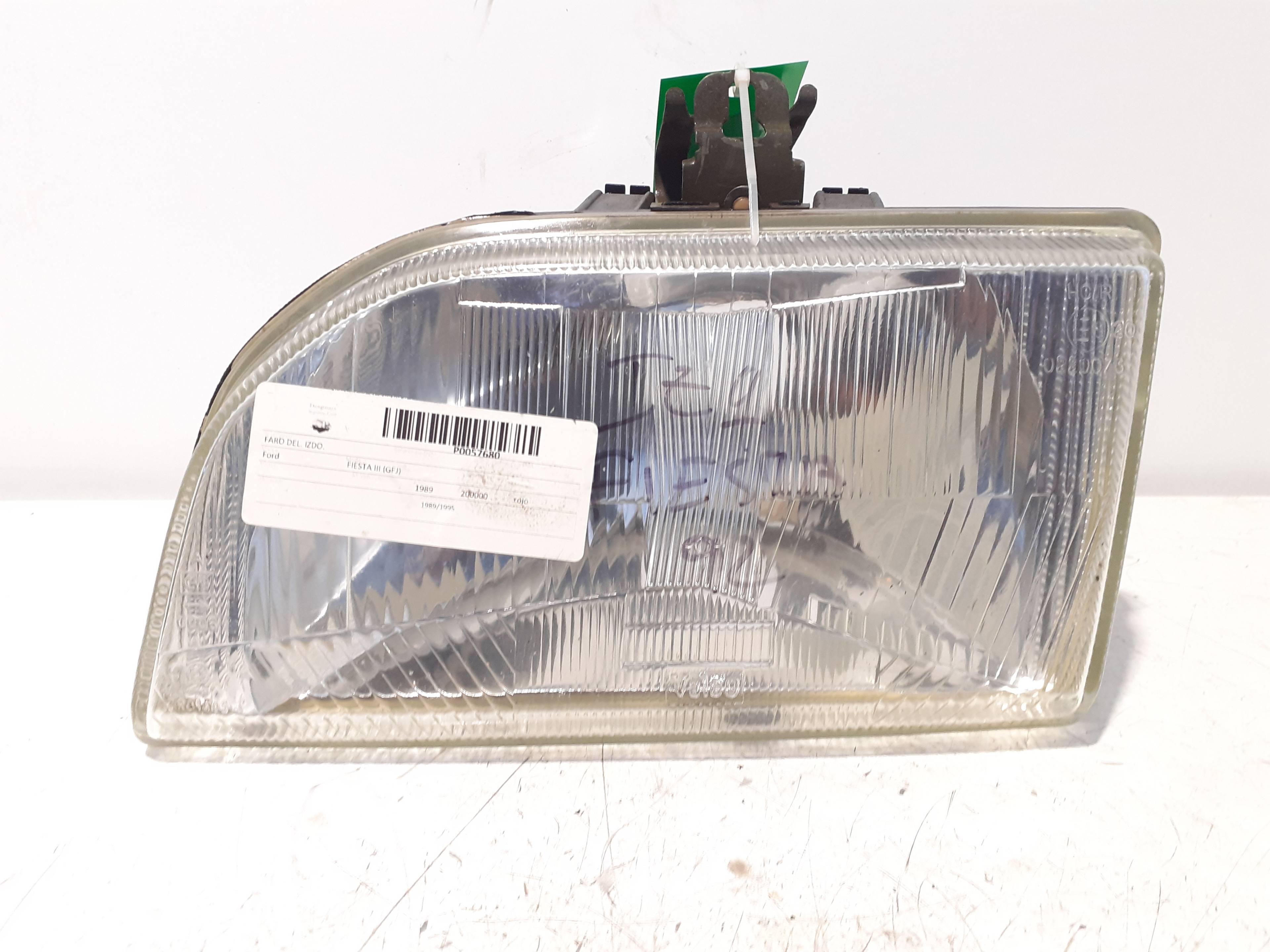 Left headlight FORD FIESTA BERL./COURIER
