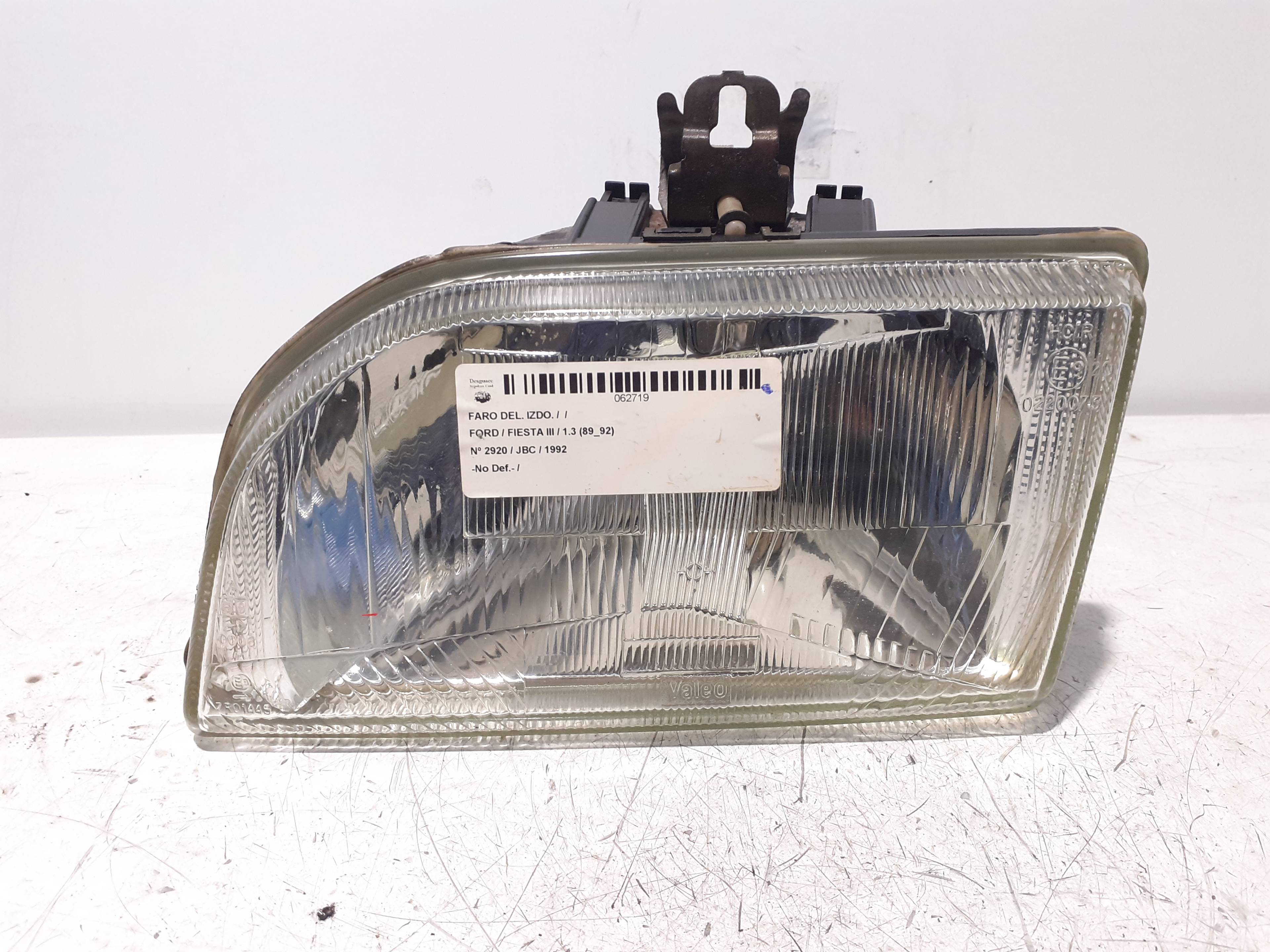 Left headlight FORD FIESTA BERL./COURIER