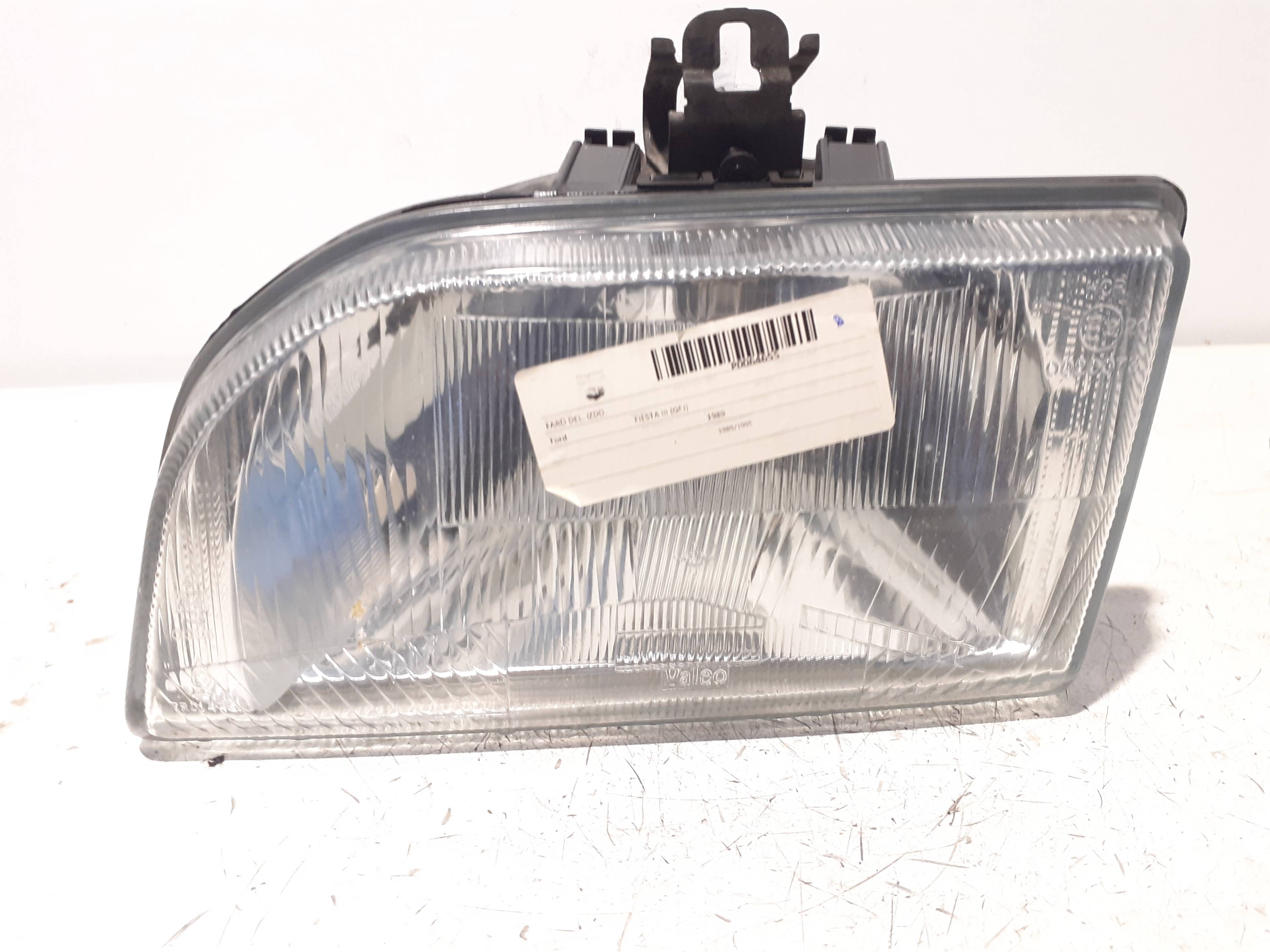 Left headlight FORD FIESTA BERL./COURIER