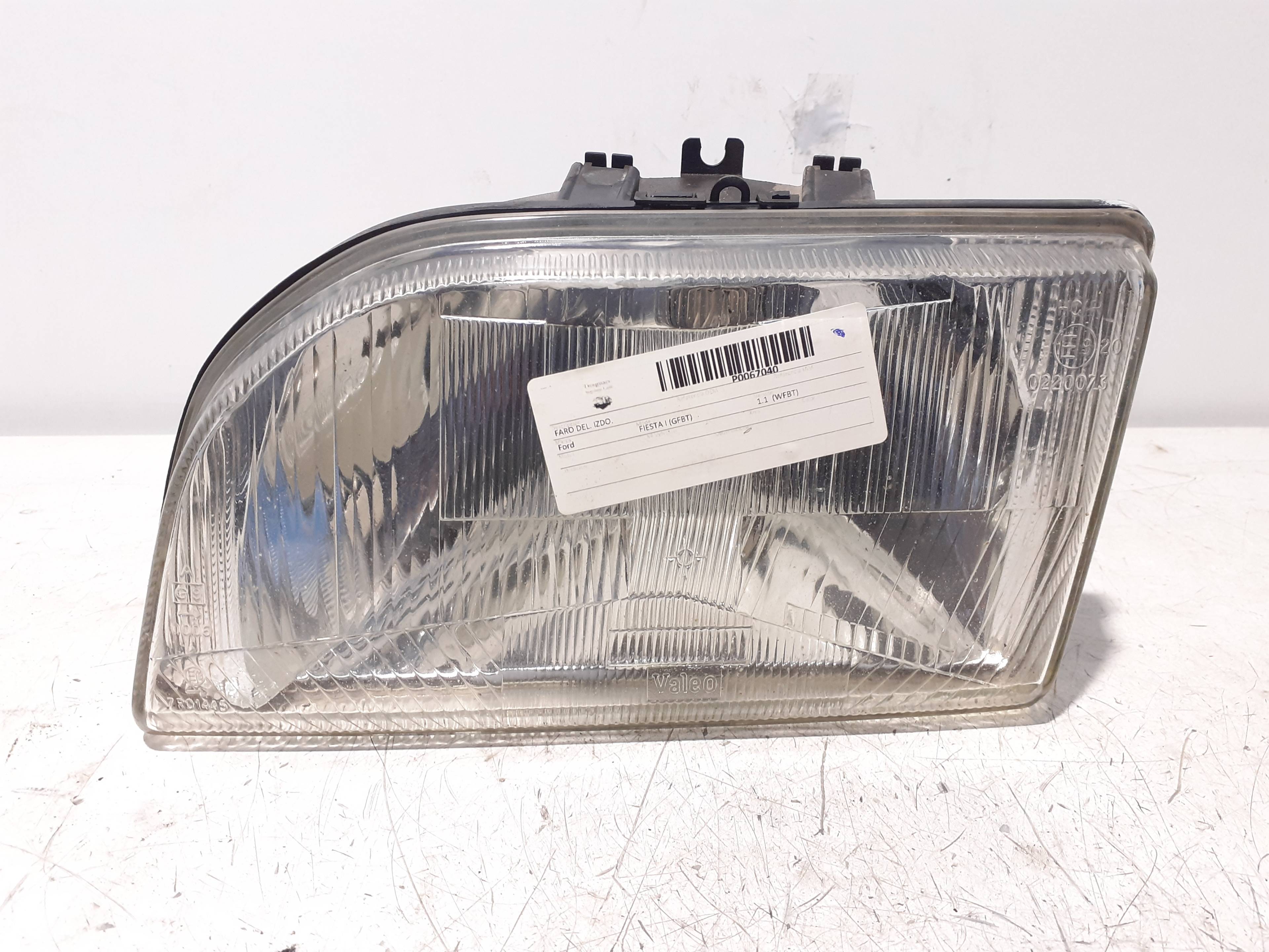 Left headlight FORD FIESTA BERL./COURIER