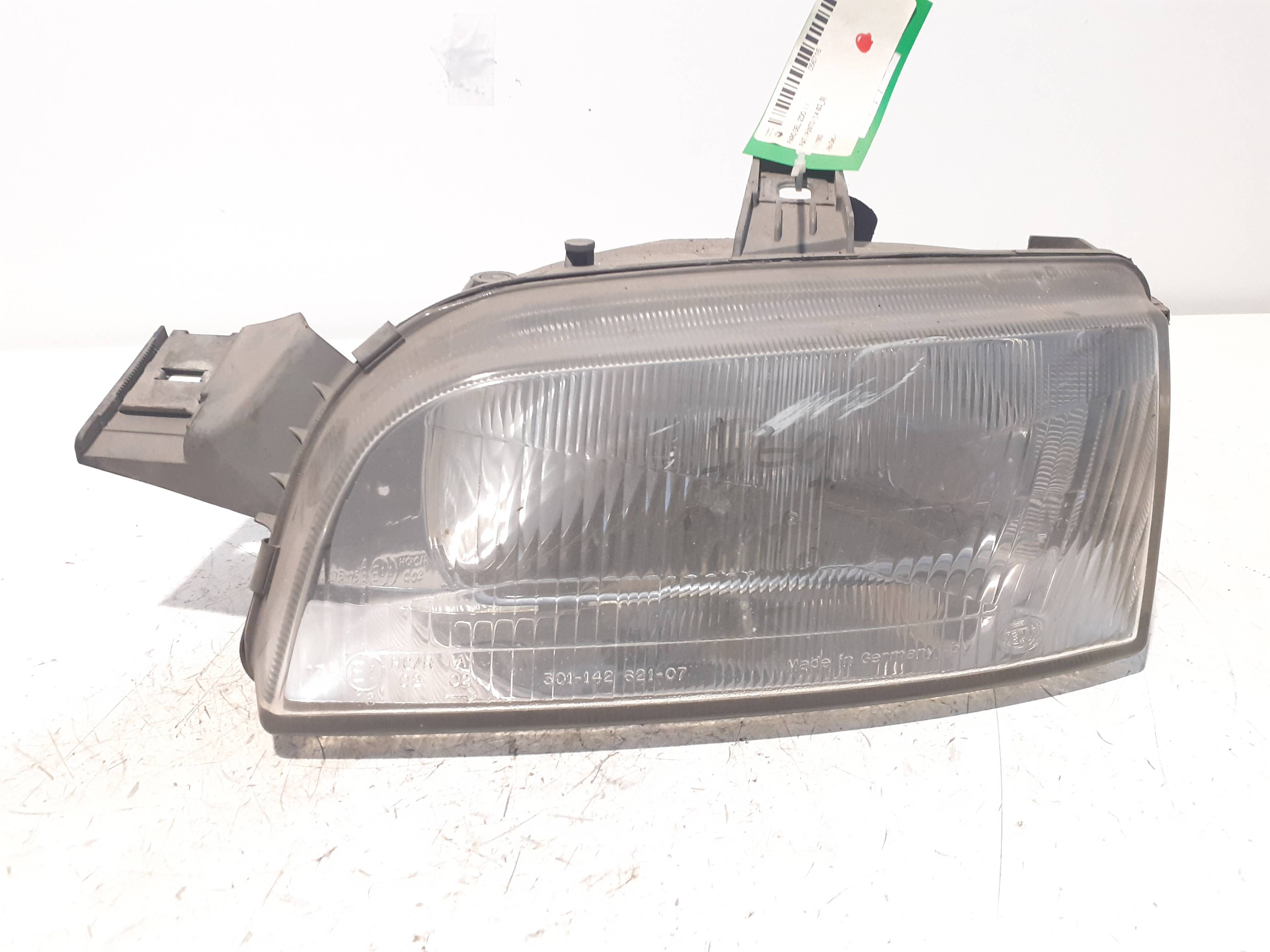 Farol esquerdo FIAT PUNTO BERL. (176)
